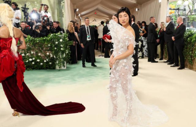 Greta Lee attends The 2024 Met Gala Celebrating Sleeping Beauties Reawakening Fashion